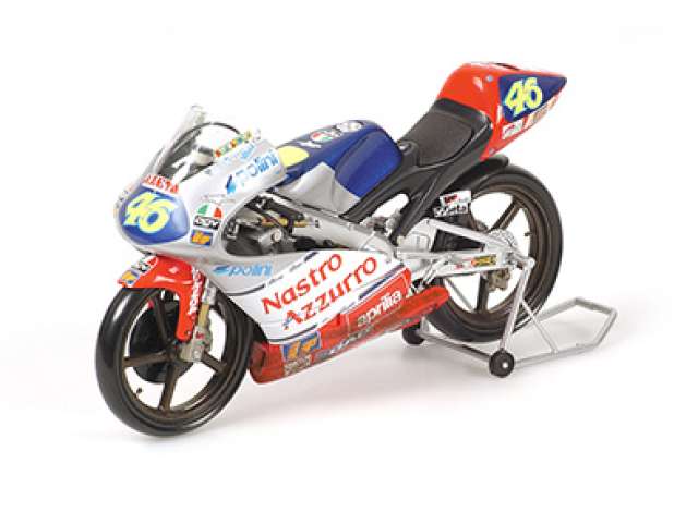 Pre-Order – 1997 Aprilia 125 CCM #46 Valentino Rossi Team Nastro Azzurro Aprilia World Champion GP 125 1997, Dirty Version, silver/red/blue 1:12 Minichamps Model (mc122970096) – ETA. July/August 2026
