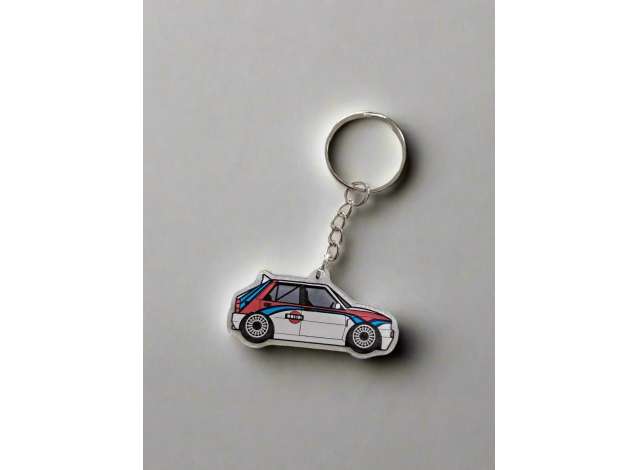 Pre-Order – Lancia Delta Tribute to Martini Livery White Bolidi Keychain (BOLIDIKYCN001) – ETA. September 2026