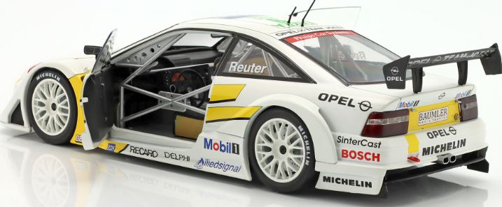 Available To Order – Opel Calibra V6 4x4 #9 DTM/ITC 1995 Manuel Reuter Team Joest 1:18 IXO Model (IXO W1802002)