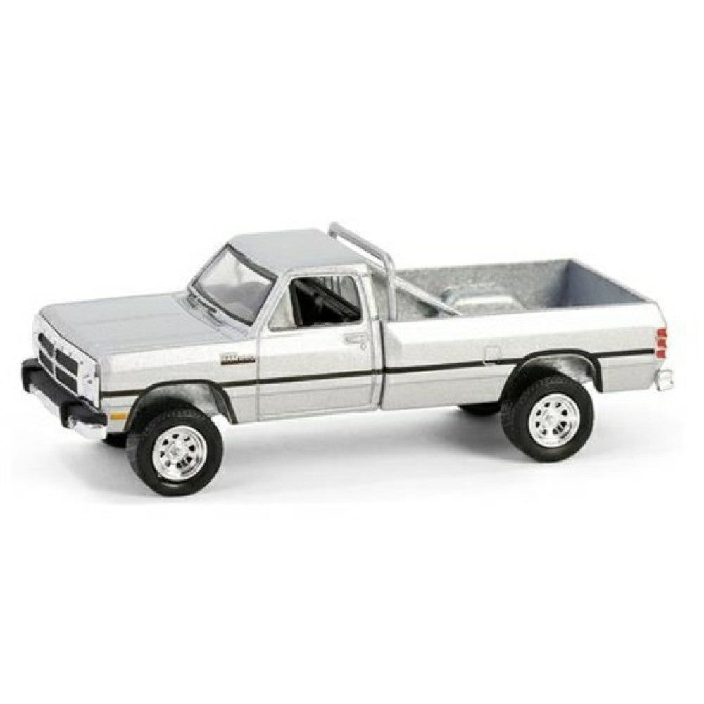 THIS ITEM IS AVAILABLE TO ORDER FROM OUR SUPPLIER - 1:64 GREENLIGHT GL35290-F ALL TERRAIN SERIES 16 - 1992 DODGE RAM D250 POWER RAM LIFTED WITH ROLLBAR - STERLING SILVER