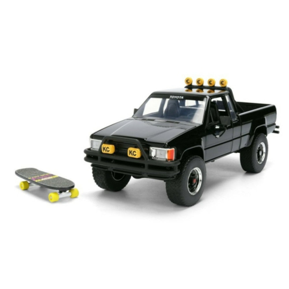 Available To Order – JAD36479 - 1:24 Hollywood Rides - Back To The Future - Toyota SR5 Pick Up 1985 - With Martys Skateboard JADA Model (JAD36479)