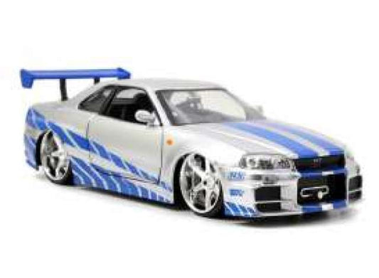 *Fast and Furious* 2002 Nissan Skyline GTR R34 *Fast and Furious*, silver with blue stripes 1:32 Jada Model (JADA97184) – ETA. March/April