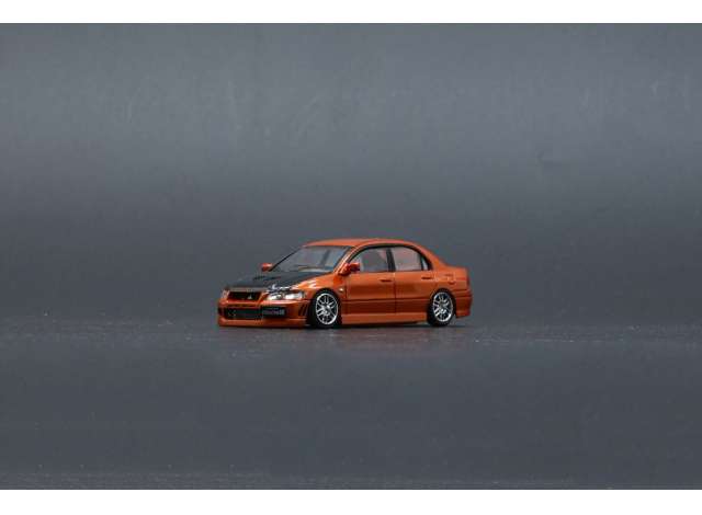 2001 Mitsubishi Lancer Evolution VII LHD, custom orange with black hood 1:64 BM Creations Model