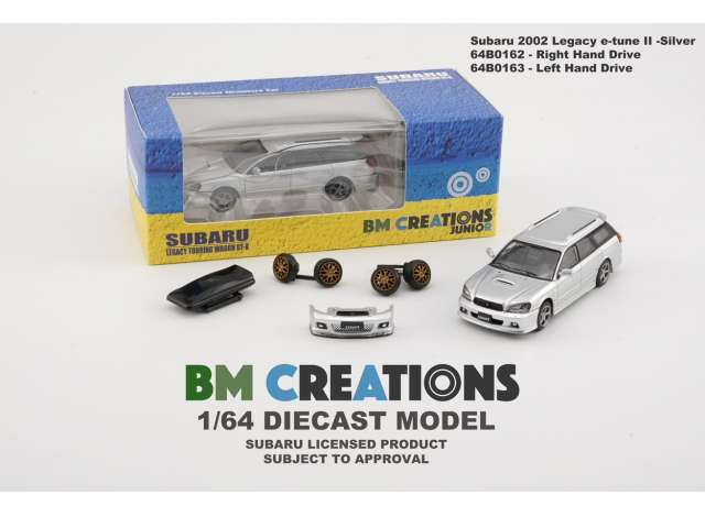 Subaru 2002 Legacy e-tune II left hand drive, silver with extra parts so you can make 2 different versions. 1:64 BM Creations Model