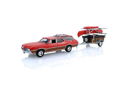 Pre-Order – 1970 Oldsmobile Vista Cruiser Rallye with canoe trailer with canoe rack, canoe and kayak *Hitch & Tow Series 34*, red 1:64 GreenLight Model (gl32340C) – ETA. September 2026