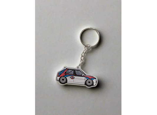 Pre-Order – Keychain Lancia Delta ribute to Martini Livery, white 1:0 Bolidi Model (BolidiKYCN001) – ETA. September 2026