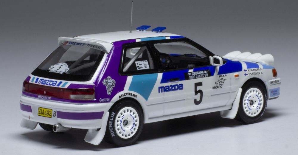 Available To Order – Mazda 323 GTX #5 Mazda Rally Team Europe 1000 Lakes Rallye 1990 w/Lights T.Salonen 1:43 IXO Model (IXO RAC358A)