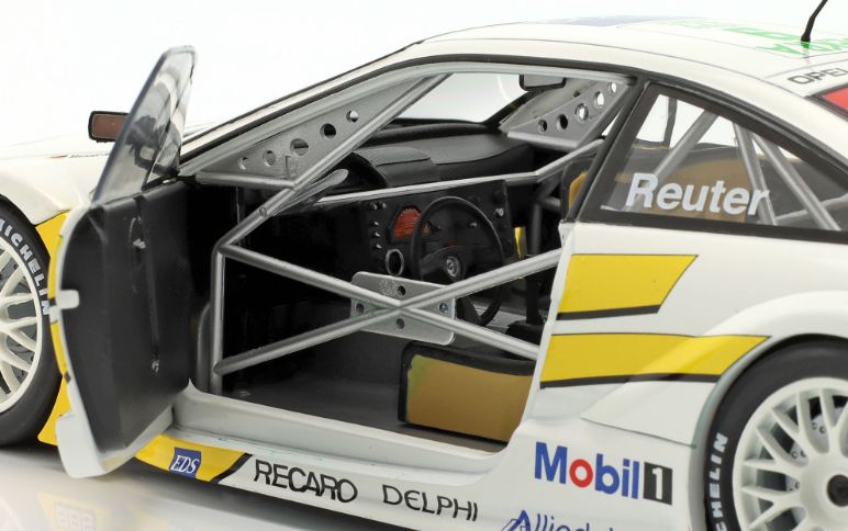 Available To Order – Opel Calibra V6 4x4 #9 DTM/ITC 1995 Manuel Reuter Team Joest 1:18 IXO Model (IXO W1802002)