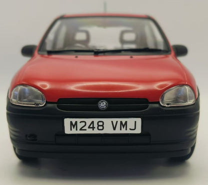 Available to Order – Vauxhall Corsa Merit Red RHD UK Exclusive 1:18 (MCG 18845)