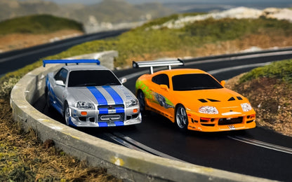 Available To Order – Fast and Furious Set 25 Years Supra vs R34 1:32 Scalextric Model (SCA C1465M)