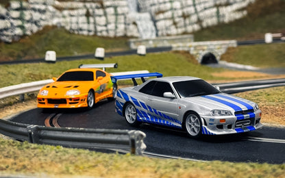 Available To Order – Fast and Furious Set 25 Years Supra vs R34 1:32 Scalextric Model (SCA C1465M)