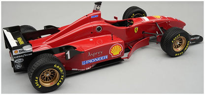 Available To Order – Ferrari F310 1996 Spain GP #1 Michael Schumacher (w/Rain Tyres) 1:18 Tecnomodels Mythos Model (TEC 18387A)