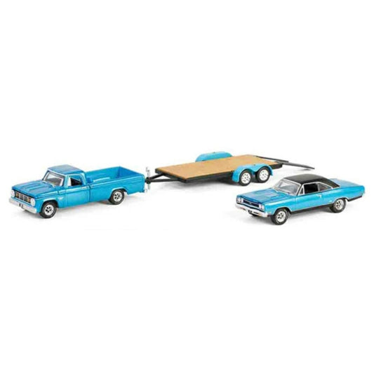 THIS ITEM IS AVAILABLE TO ORDER FROM OUR SUPPLIER - 1:64 GREENLIGHT GL31180-A HOLLYWOOD HITCH AND TOW SERIES 13 - GRAVEYARD CARZ (2012-CURRENT TV SERIES) 1969 PLYMOUTH GTX WITH 1967 DODGE D-200 AND FLATBED TRAILER
