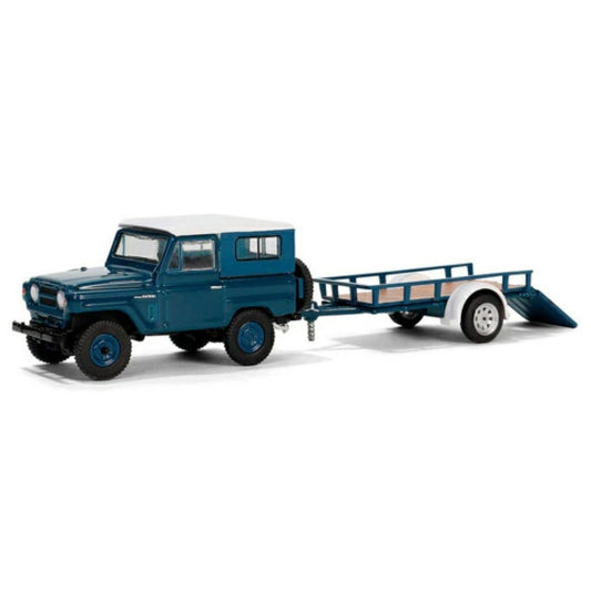 THIS ITEM IS AVAILABLE TO ORDER FROM OUR SUPPLIER - 1:64 GREENLIGHT GL32310-A HITCH AND TOW SERIES 31 - 1961 NISSAN PATROL HARD TOPWITH UTILITY TRAILER - BLUE AND WHITE