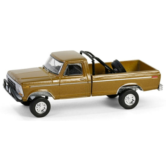 THIS ITEM IS AVAILABLE TO ORDER FROM OUR SUPPLIER - 1:64 GREENLIGHT GL35290-D ALL TERRAIN SERIES 16 - 1979 FORD F250 RANGER LIFTED WITH ROLLBAR MOUNTED SPARE TIRE - GOLD METALLIC
