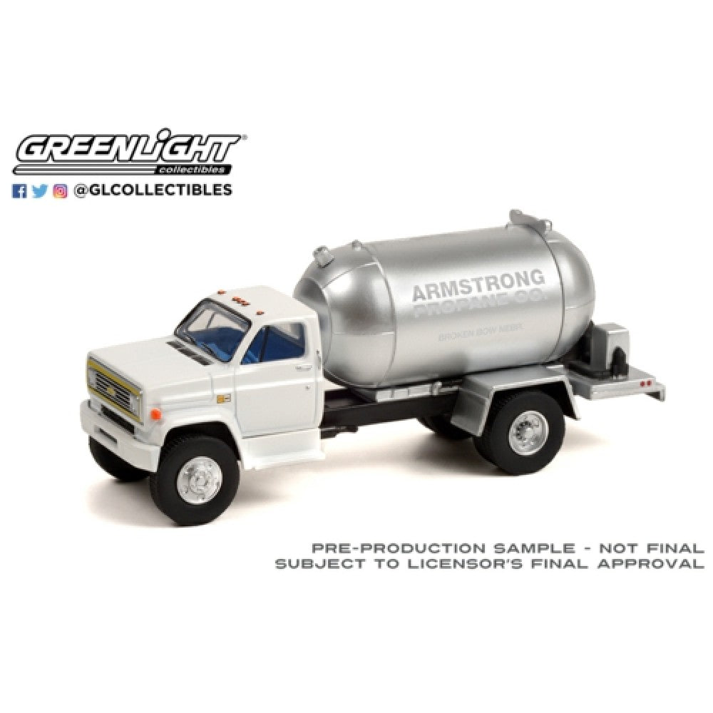 THIS ITEM IS AVAILABLE TO ORDER FROM OUR SUPPLIER - 1:64 GREENLIGHT GL45140-B S.D. TRUCKS SERIES 14 1982 CHEVROLET C-60 PROPANE TRUCK ARMSTRONG PROPANE CO.