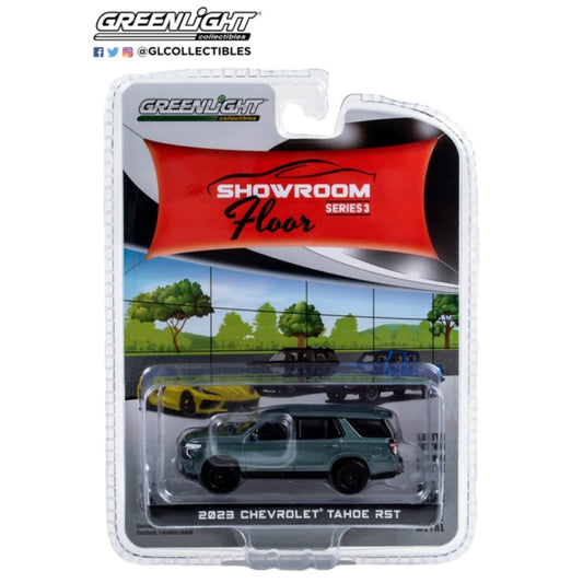 THIS ITEM IS AVAILABLE TO ORDER FROM OUR SUPPLIER - 1:64 GREENLIGHT GL68030-C SHOWROOM FLOOR SERIES 3 2023 CHEVROLET TAHOE RST SILVER SAGE METALLIC