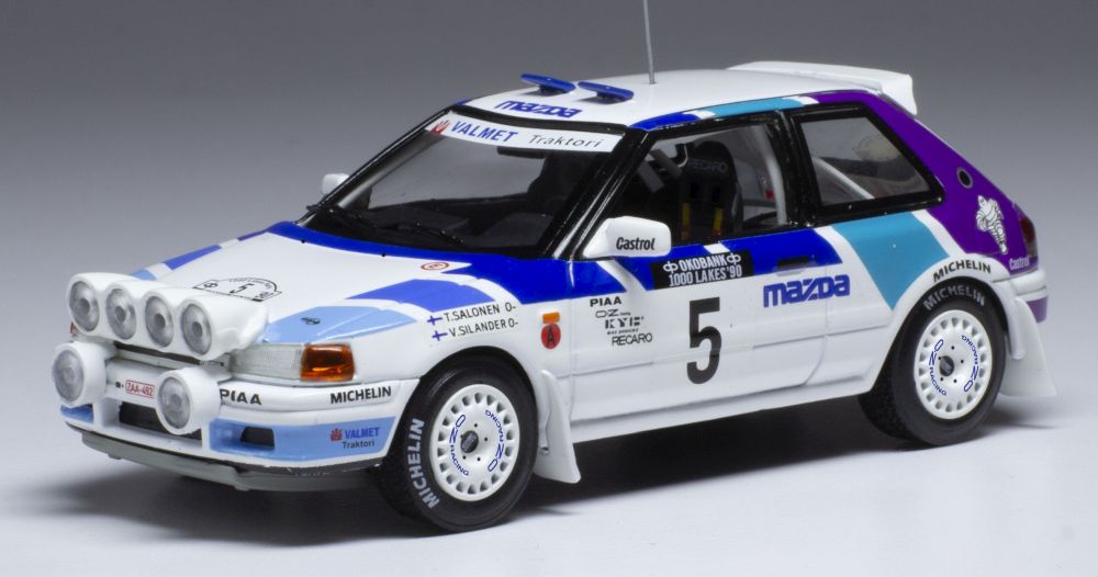 Available To Order – Mazda 323 GTX #5 Mazda Rally Team Europe 1000 Lakes Rallye 1990 w/Lights T.Salonen 1:43 IXO Model (IXO RAC358A)