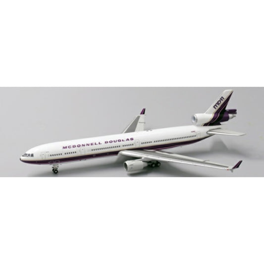 THIS ITEM IS AVAILABLE TO ORDER FROM OUR SUPPLIER - 1:400 JC WINGS JCLH4076 HOUSE COLOR MCDONNELL DOUGLAS MD-11 REG: N211MD WITH ANTENNA