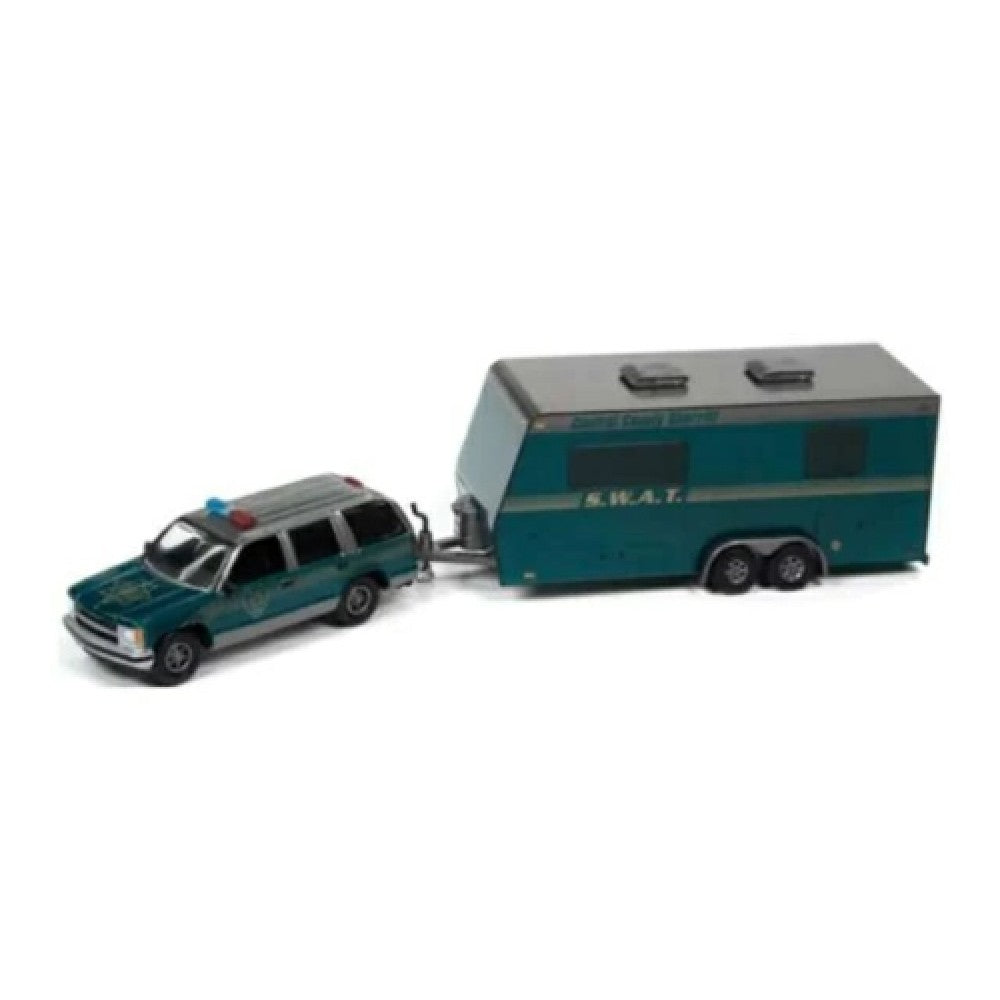 THIS ITEM IS AVAILABLE TO ORDER FROM OUR SUPPLIER - 1:64 JOHNNY LIGHTNING JLBT016B-2 1997 CHEVY TAHOE WITH CAMPER TRAILER TRUCK AND TRAILER