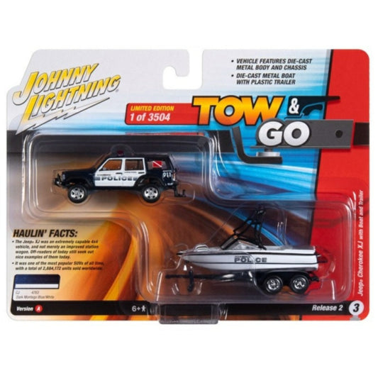 THIS ITEM IS AVAILABLE TO ORDER FROM OUR SUPPLIER - 1:64 JOHNNY LIGHTNING JLBT018A-3 1988 JEEP CHEROKEE W/MASTERCRAFT BOAT AND LIGHT BAR DARK MONTEGO BLUE