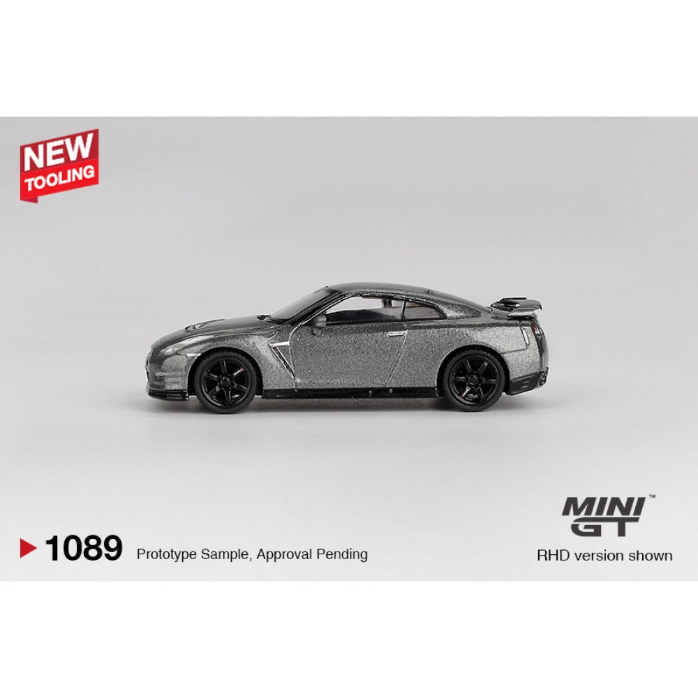 Nissan GT-R 2013 Dark Metal Grey NISMO R35 Crs Version (RHD) Blister Packaging 1:64 Mini GT Model Car (MGT01089-BL)