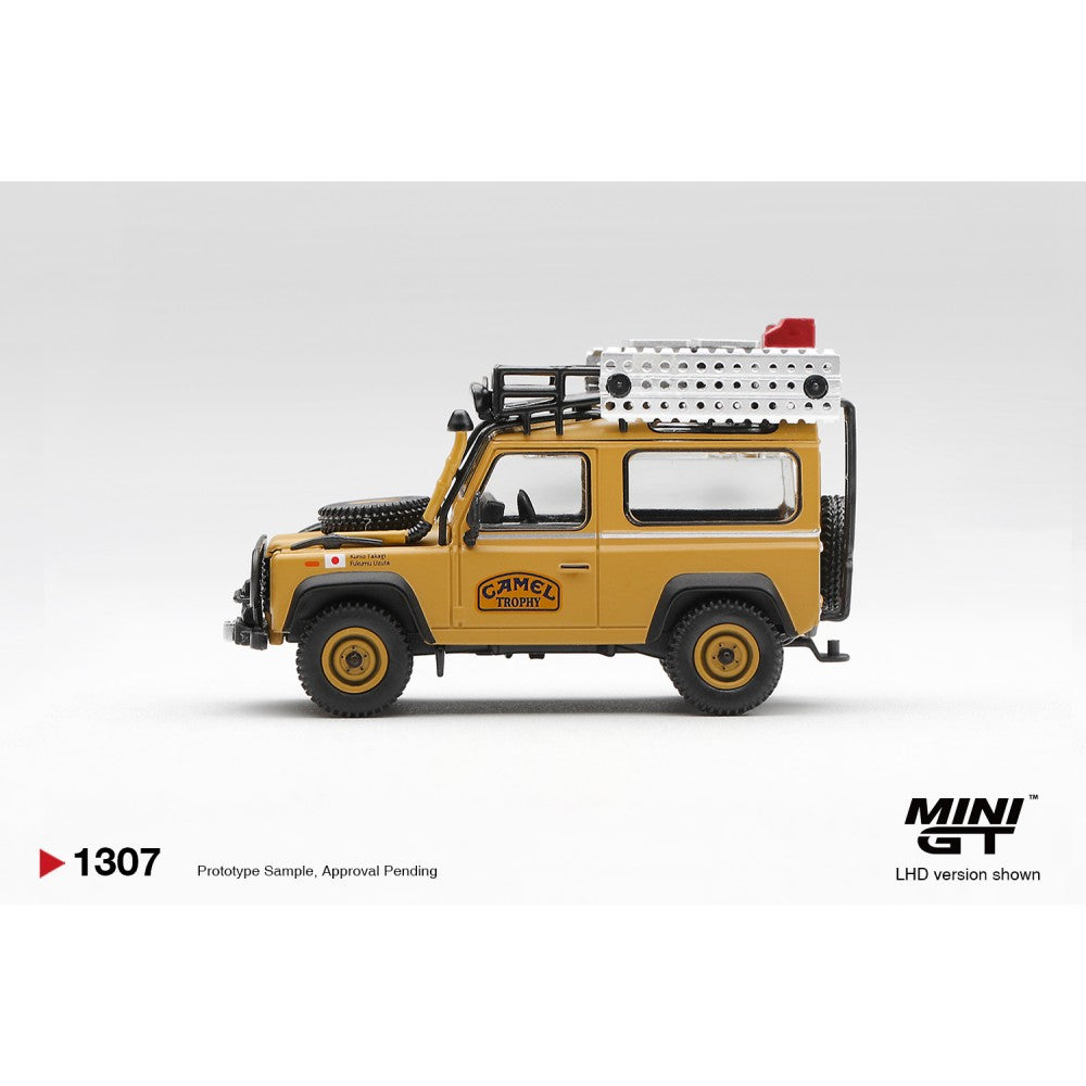 Pre-Order – Land Rover Defender 90 1985 Camel Trophy Borneo Team Japan (LHD) Blister Packaging MGT01307-BL Stocks Due Jan / Feb 2027 1:64 Mini GT Diecast Model