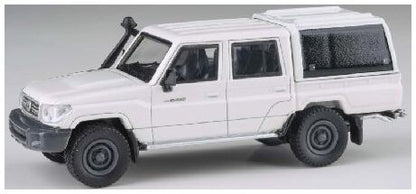 Toyota Land Cruiser 79 French Vanilla w/Canopy (RHD) 1:64 – diecast model