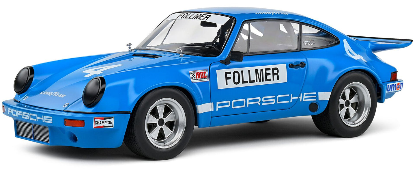 Available to Order – Porsche 911 Iroc Blue #4 Follmer Iroc Riverside 1974 1:18 (SOL 1810702)