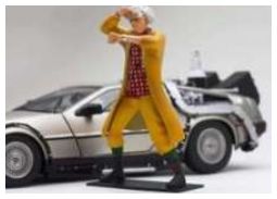 Available To Order – Back to the Future Dr. Emmett Brown Figure 1:24 (TRN 24001)